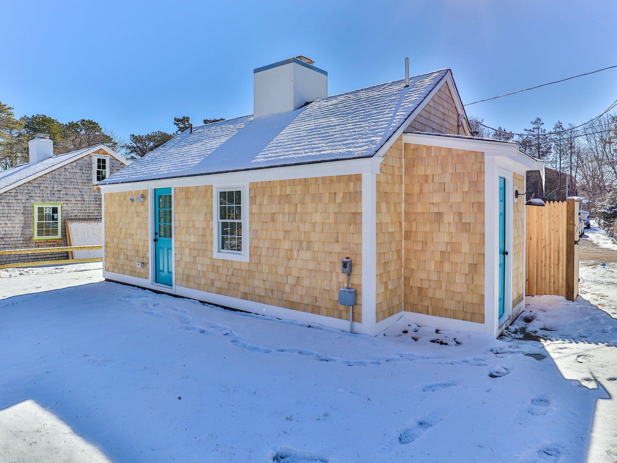 10 Heintz Road Dennis Port, MA 02639 - Photo 13 of 15 a view of backyard with blue space