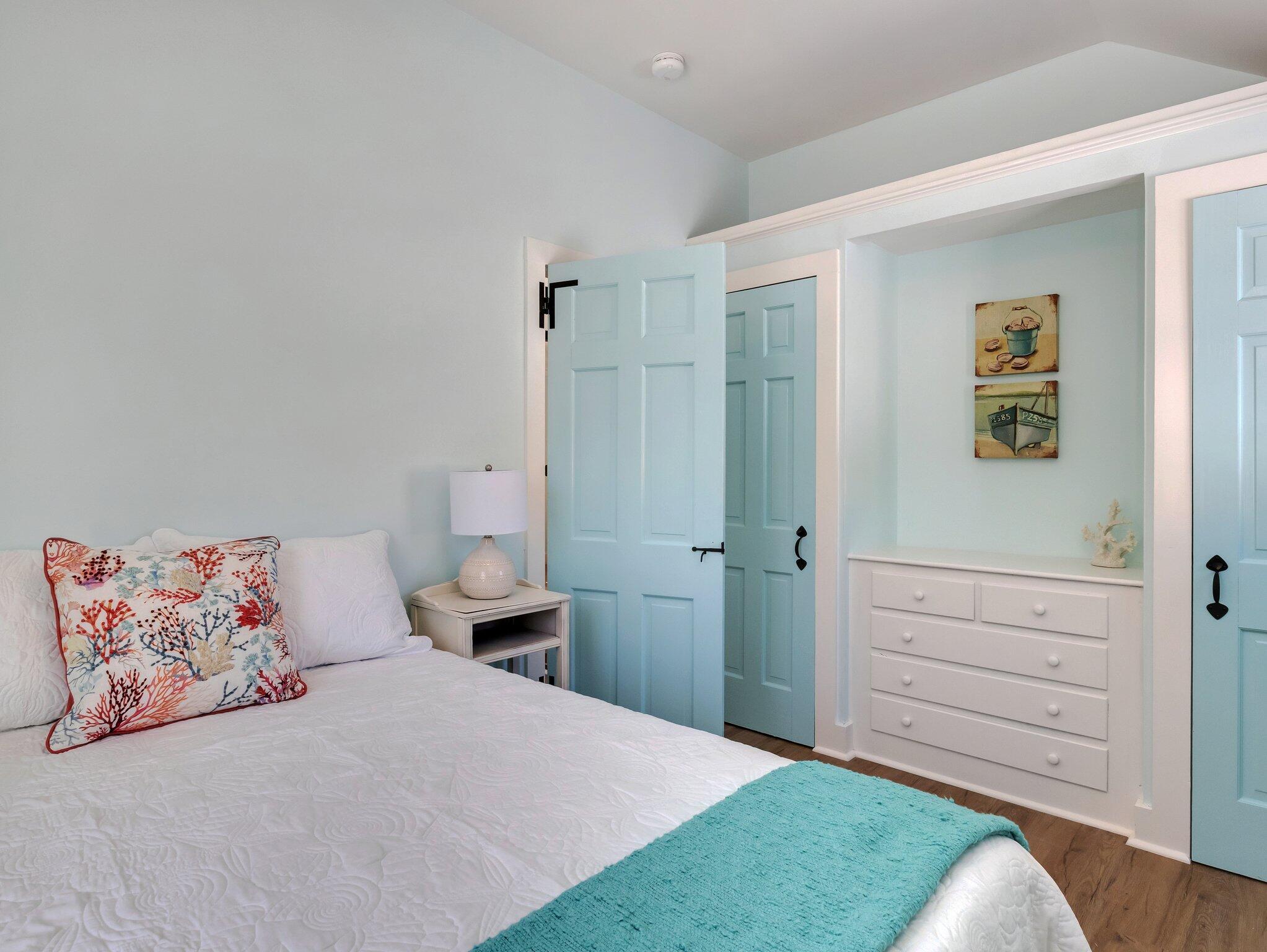 10 Heintz Road Dennis Port, MA 02639 - Photo 9 of 15 a spacious bedroom with a bed and a dresser