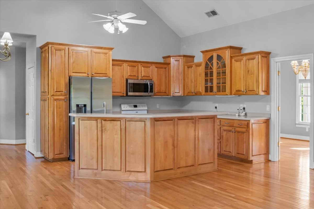 2440 Maple Grove Road Dickson, TN 37055 - Photo 18 of 99 a kitchen with stainless steel appliances a refrigerator sink and microwave