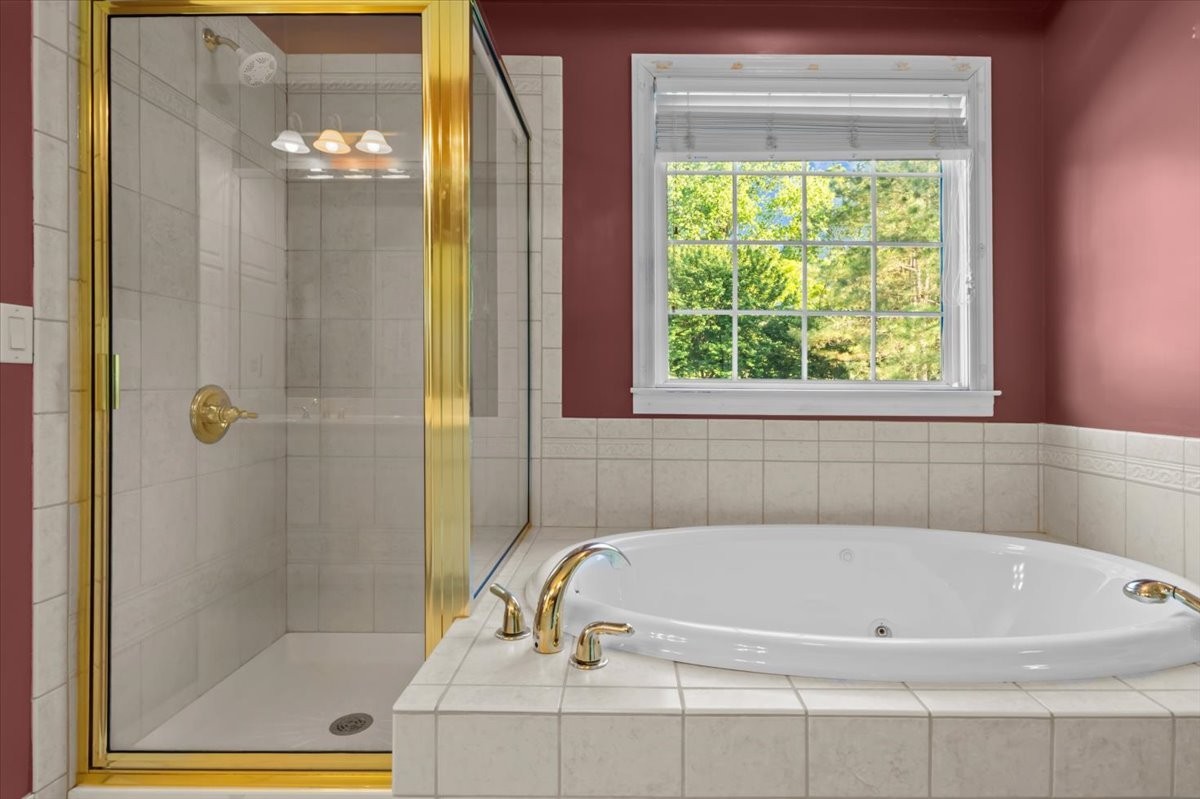 2440 Maple Grove Road Dickson, TN 37055 - Photo 26 of 99 a white bath tub sitting next to a window