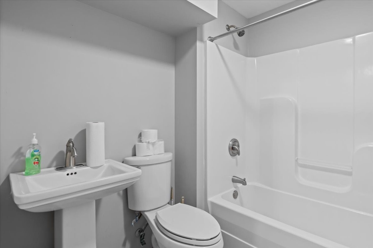 2440 Maple Grove Road Dickson, TN 37055 - Photo 42 of 99 a bathroom with a sink toilet and shower