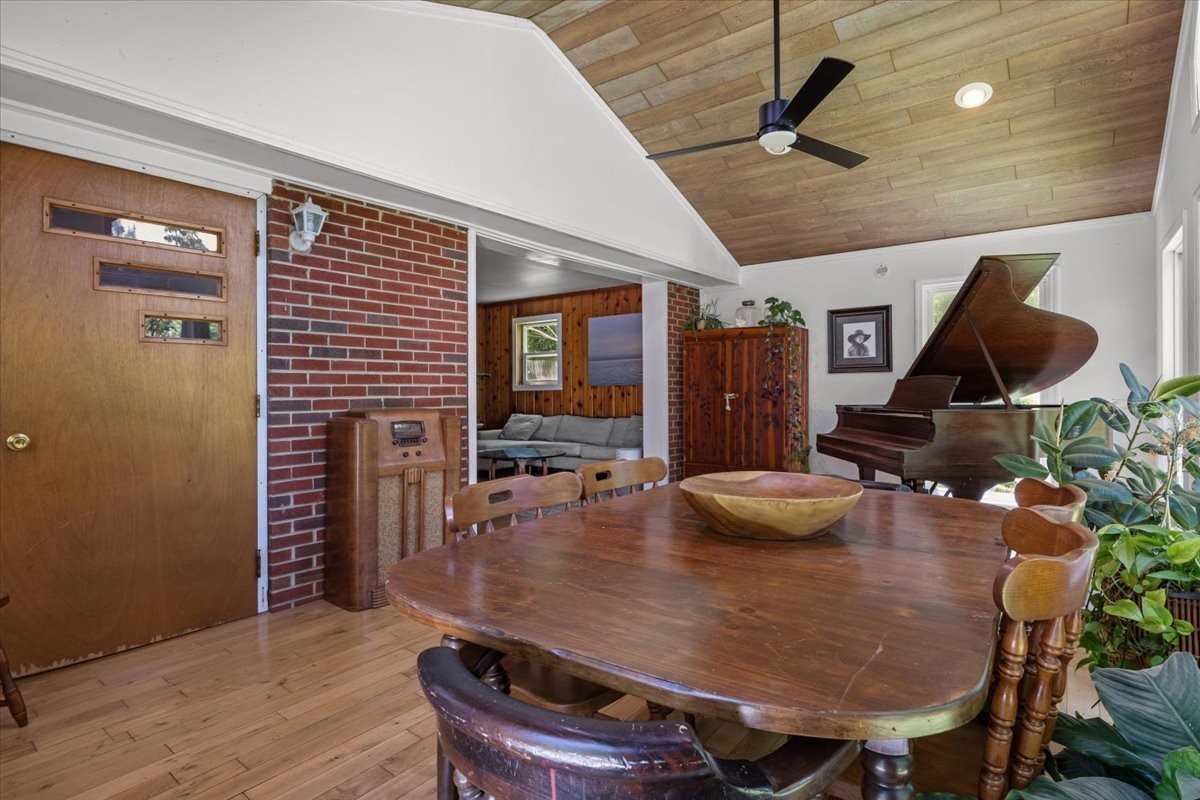 2440 Maple Grove Road Dickson, TN 37055 - Photo 56 of 99 a dining room with furniture and wooden floor