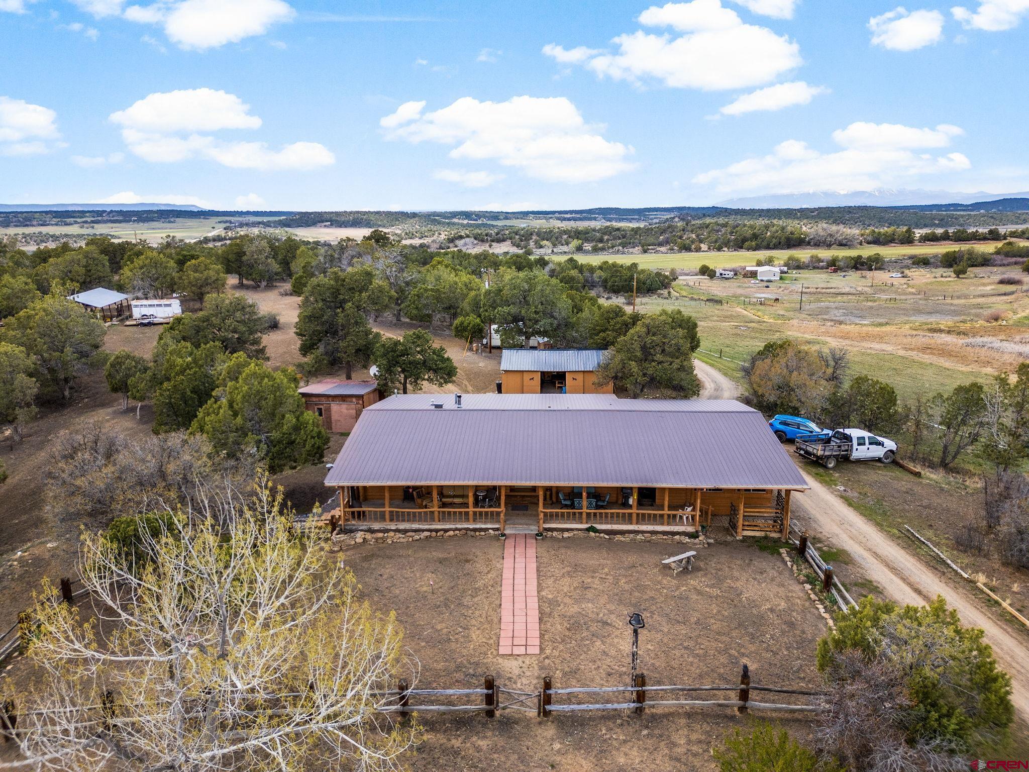 an aerial view of a house with a outdoor space