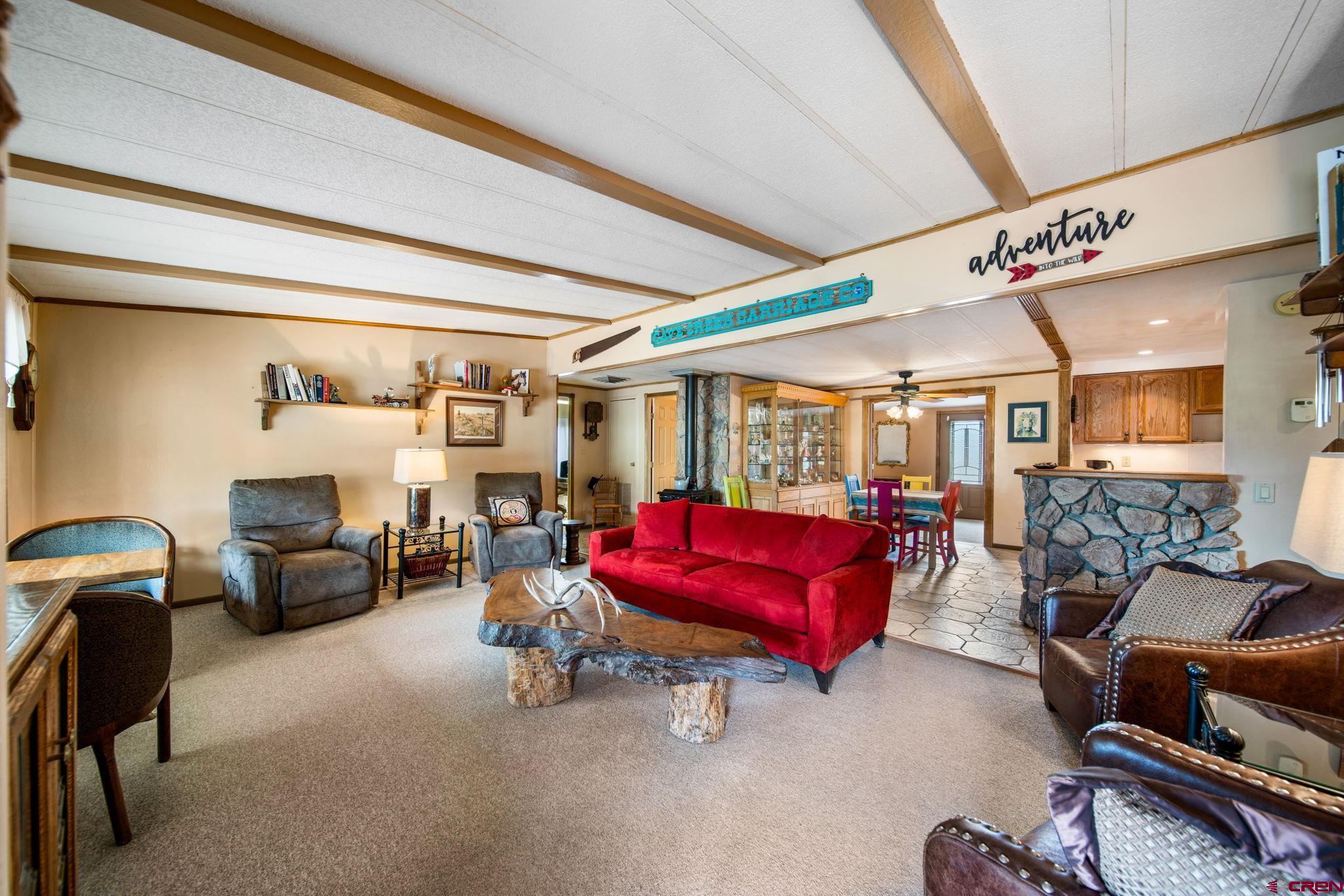 7853 County Road 334 Ignacio, CO 81137 - Photo 19 of 39 a living room with furniture a couch and a table