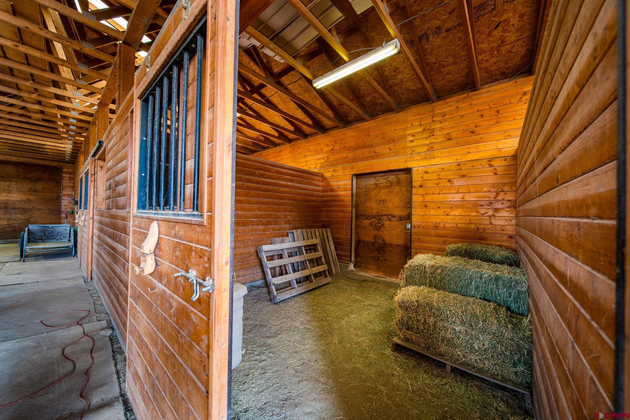 7853 County Road 334 Ignacio, CO 81137 - Photo 27 of 39 a backyard of a house with outdoor seating