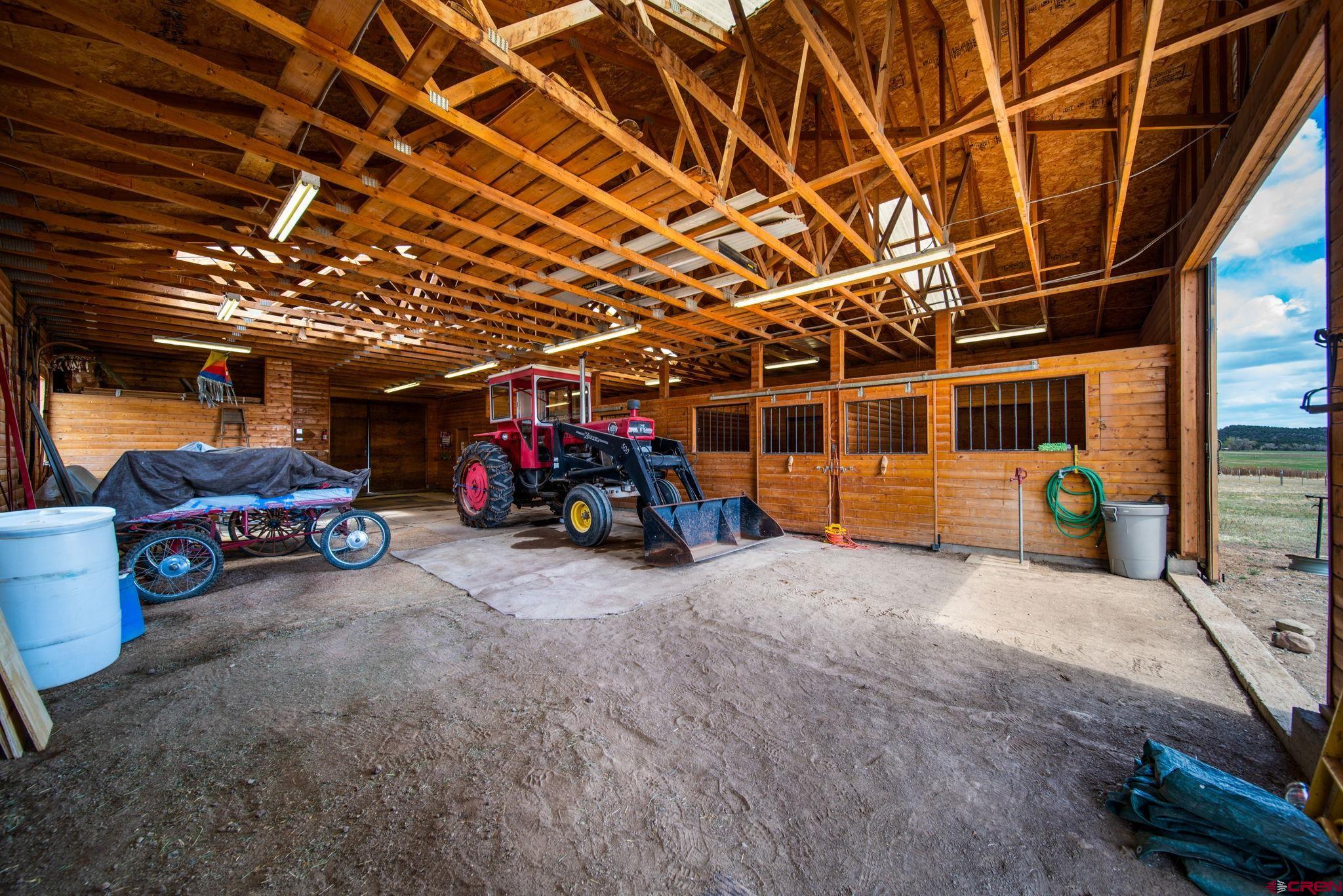 7853 County Road 334 Ignacio, CO 81137 - Photo 28 of 39 a view of a garage with parked cars