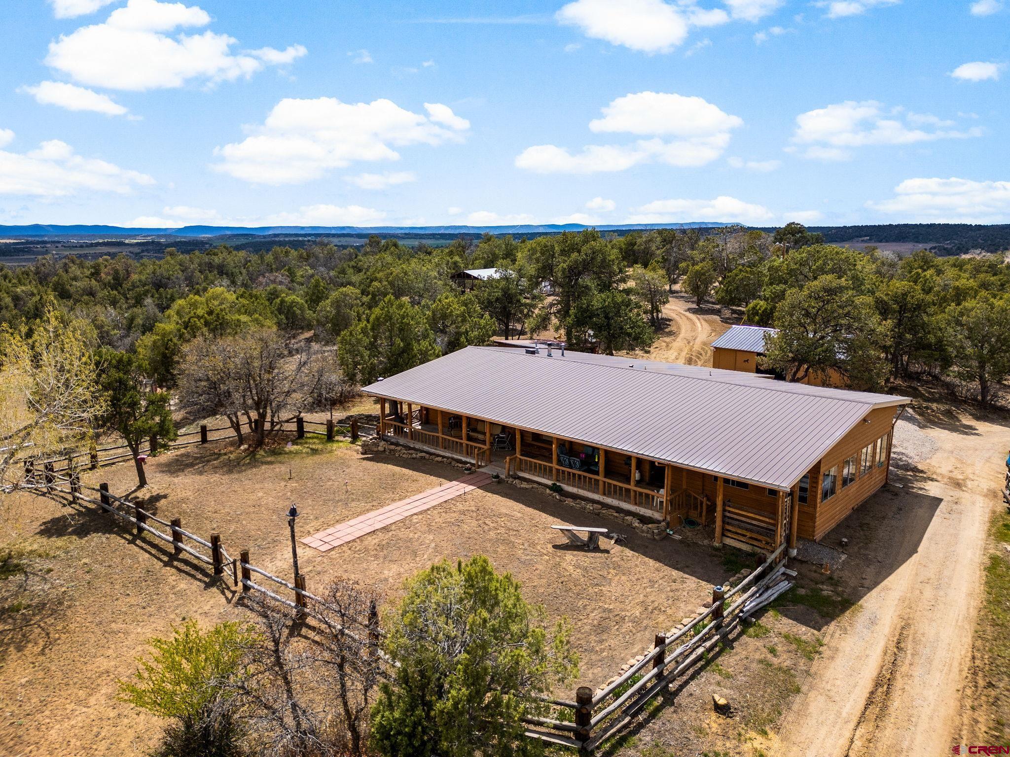 7853 County Road 334 Ignacio, CO 81137 - Photo 5 of 39 an aerial view of a house with a yard