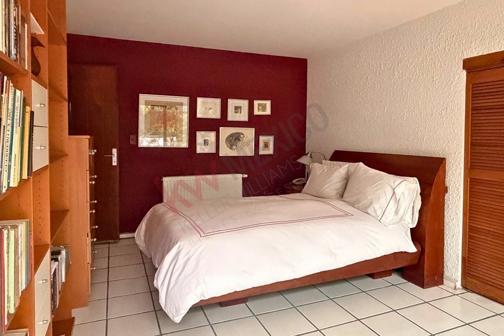 36 Perugino Bath, undefined 03740 - Photo 16 of 29 a bedroom with a bed and a large window