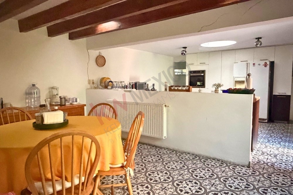 36 Perugino Bath, undefined 03740 - Photo 4 of 29 a dining room with furniture a window and kitchen view