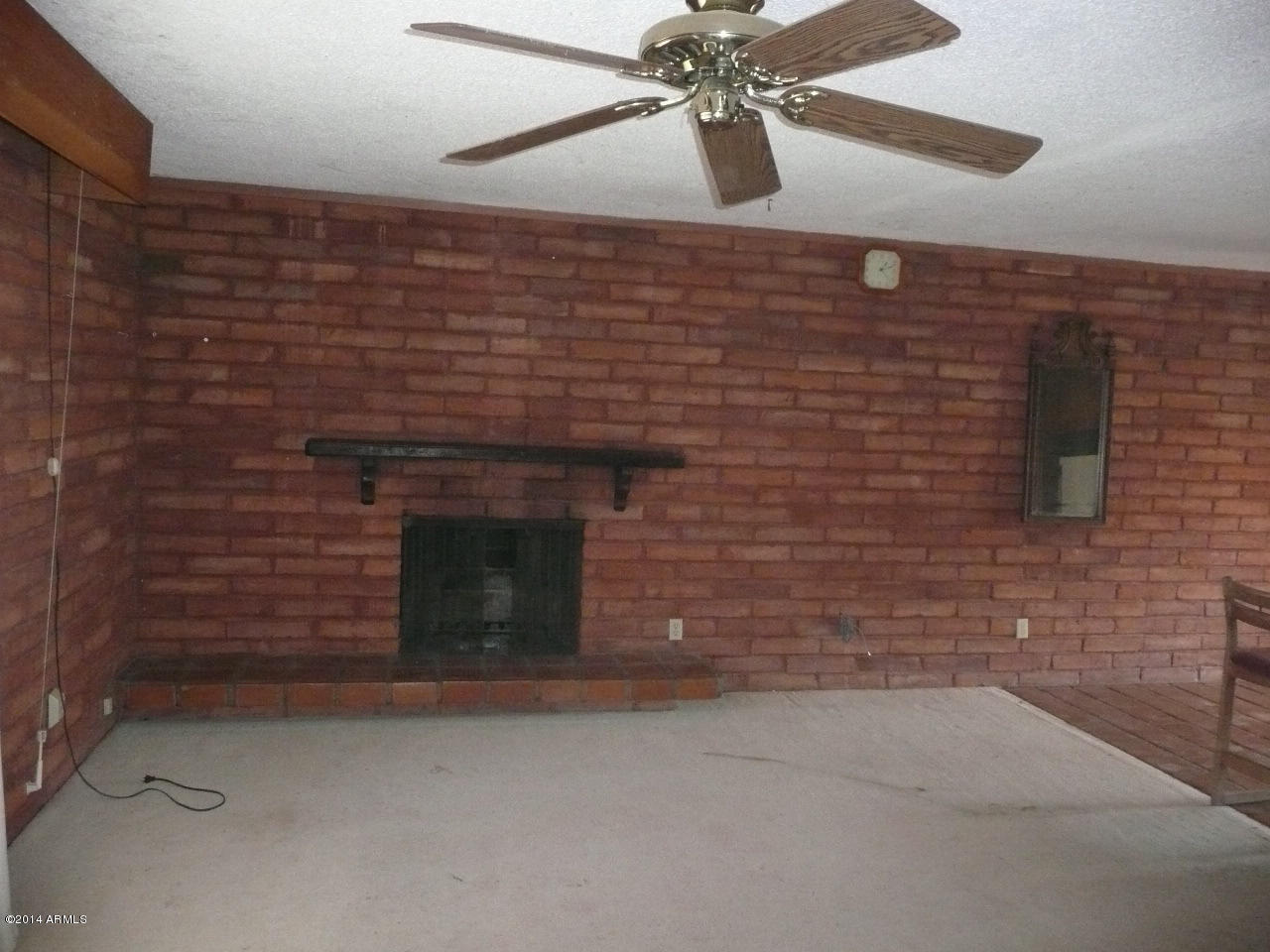 2535 West Dobbins Road Phoenix, AZ 85041 - Photo 5 of 10 Red brick wall with fireplace