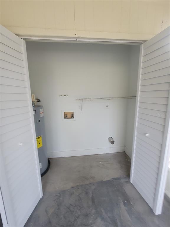 4331 Azora Road Spring Hill, FL 34608 - Photo 13 of 16 a view of walk in closet