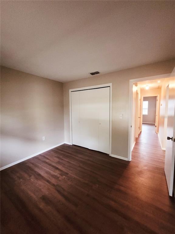 4331 Azora Road Spring Hill, FL 34608 - Photo 10 of 16 a view of empty room with wooden floor
