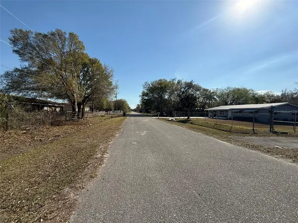 a view of road with trees