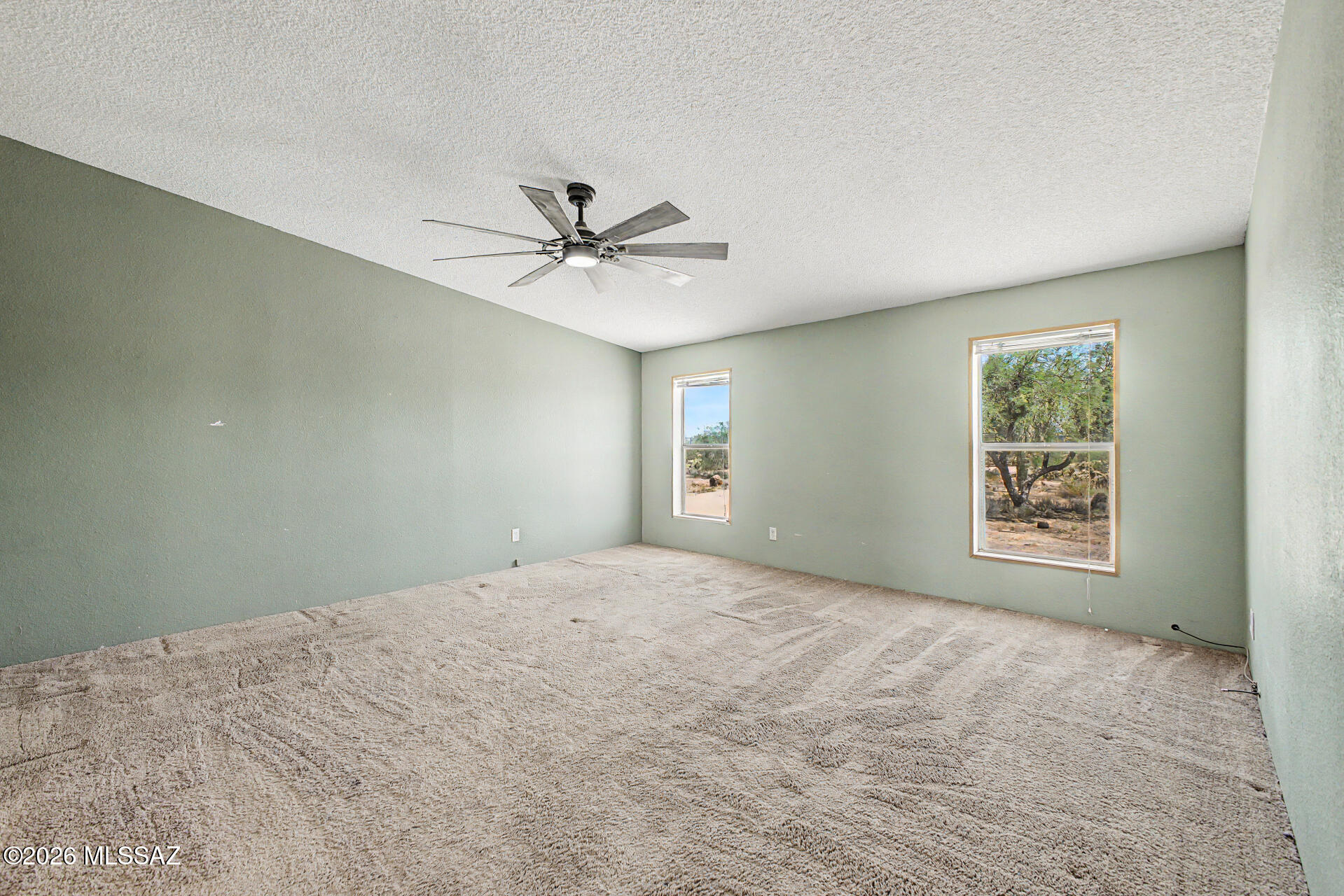 1911 West Thunder Road Vail, AZ 85641 - Photo 18 of 38 a view of an empty room with a window