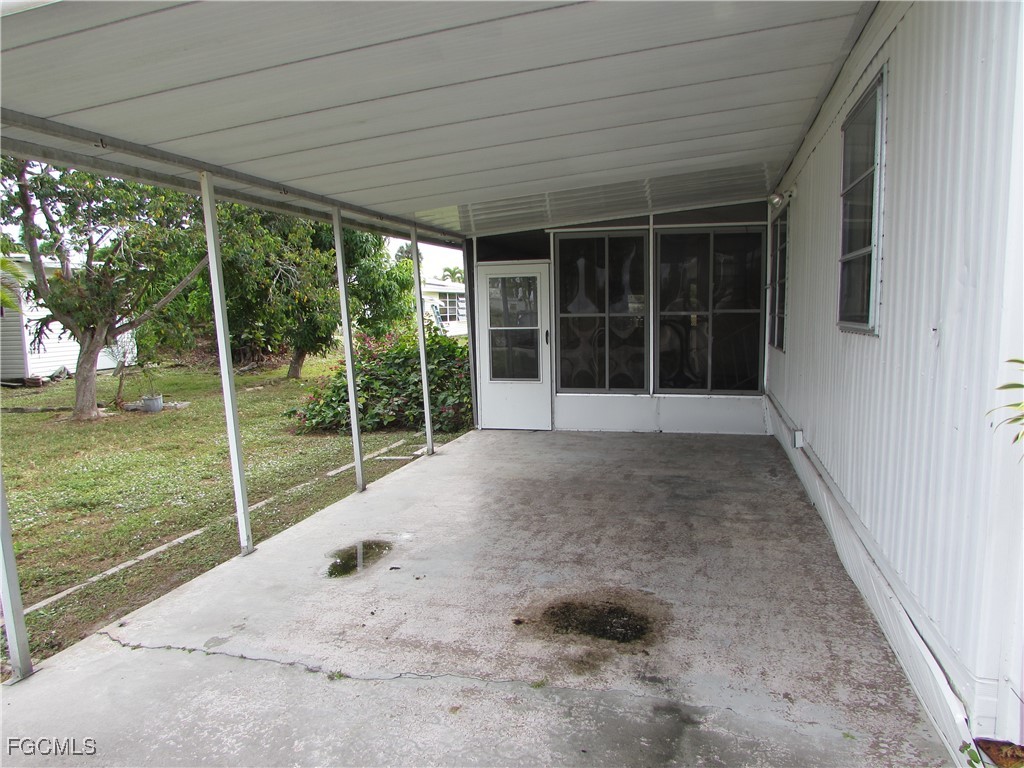 7711 Farrell Road Bokeelia, FL 33922 - Photo 3 of 21 a view of backyard with green space