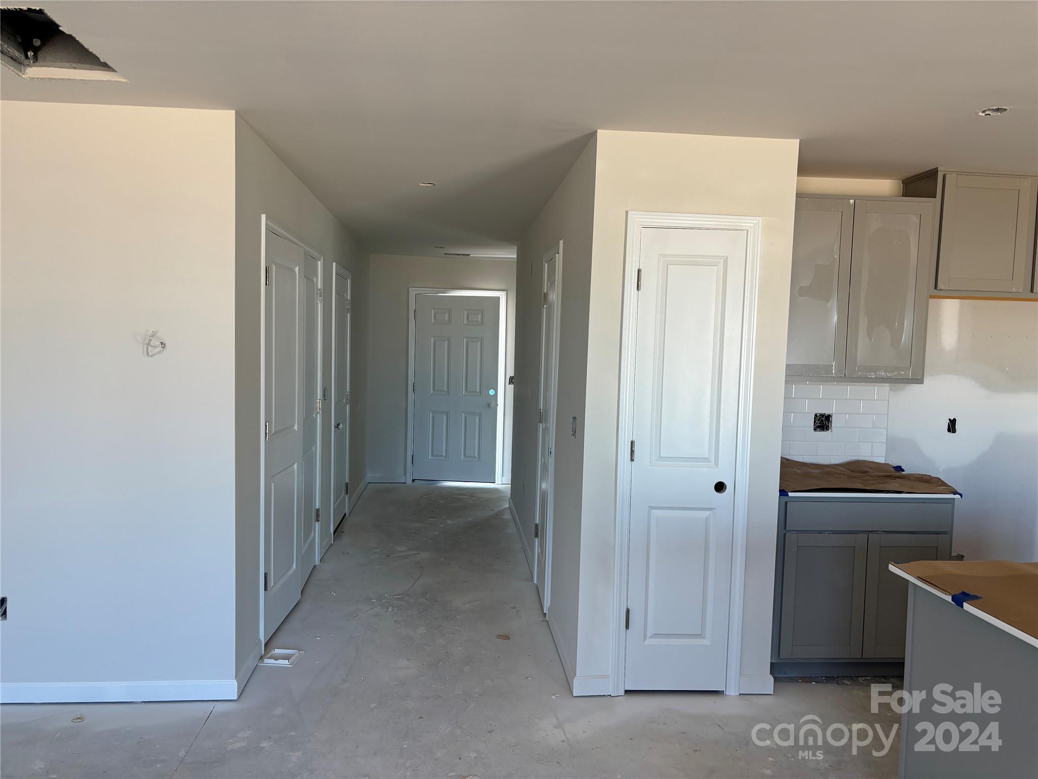 627 Mile Crk Road, Unit 69 Edgemoor, SC 29712 - Photo 3 of 16 a view of a hallway with closet and utility room
