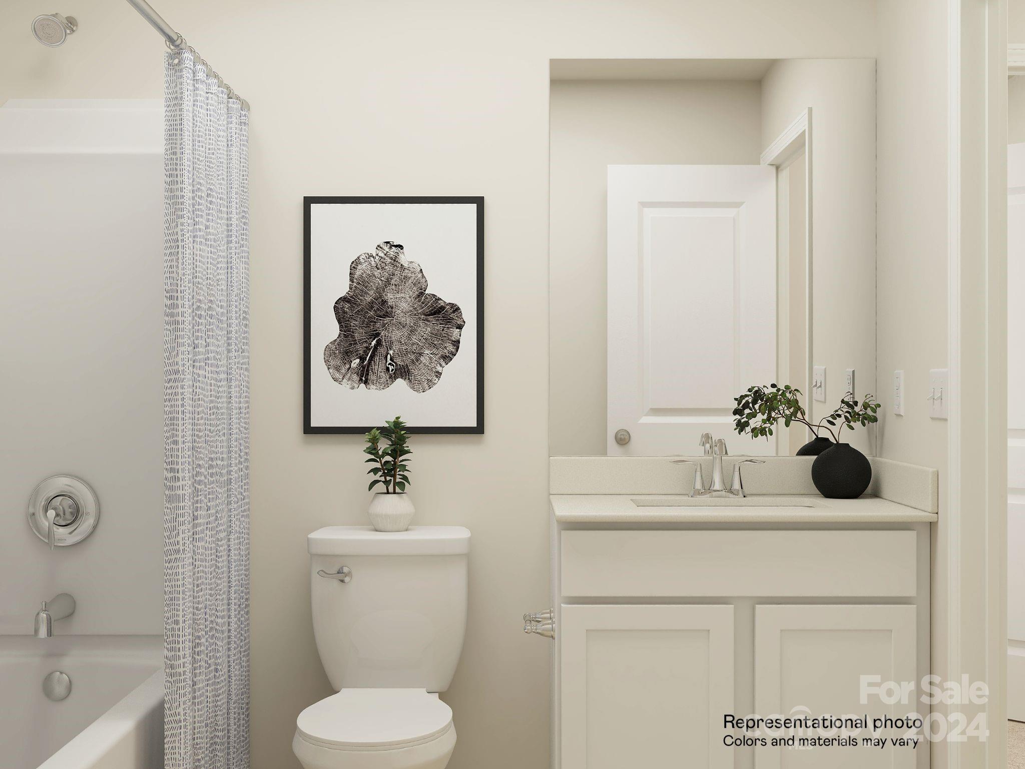 627 Mile Crk Road, Unit 69 Edgemoor, SC 29712 - Photo 10 of 16 a bathroom with a sink a toilet and a mirror