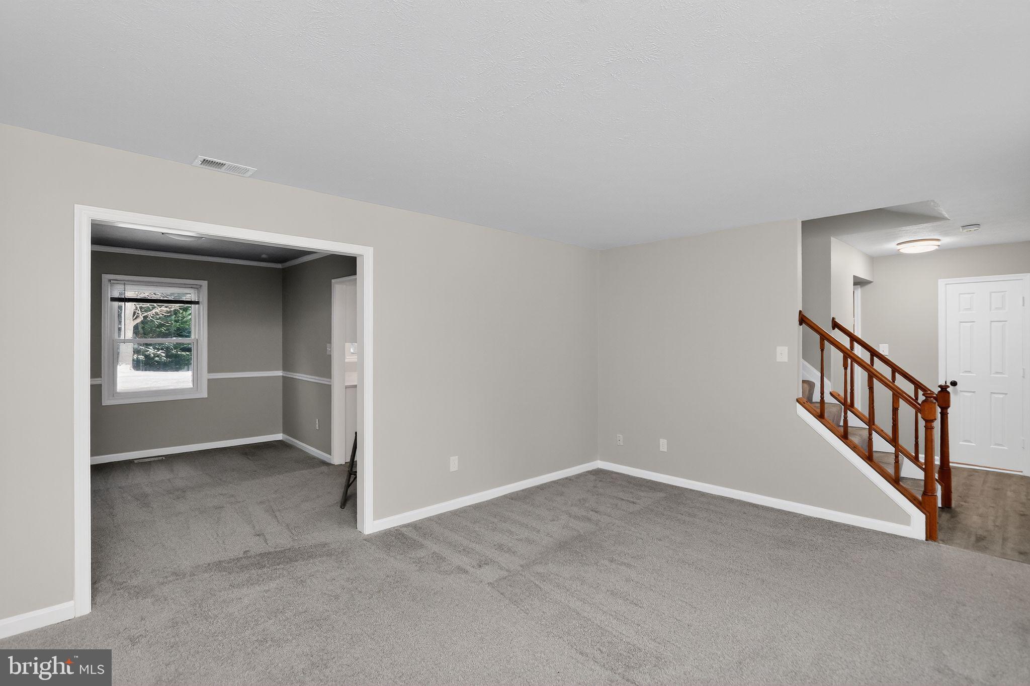 11979 Falling Creek Drive Manassas, VA 20112 - Photo 15 of 30 a view of an empty room with a window