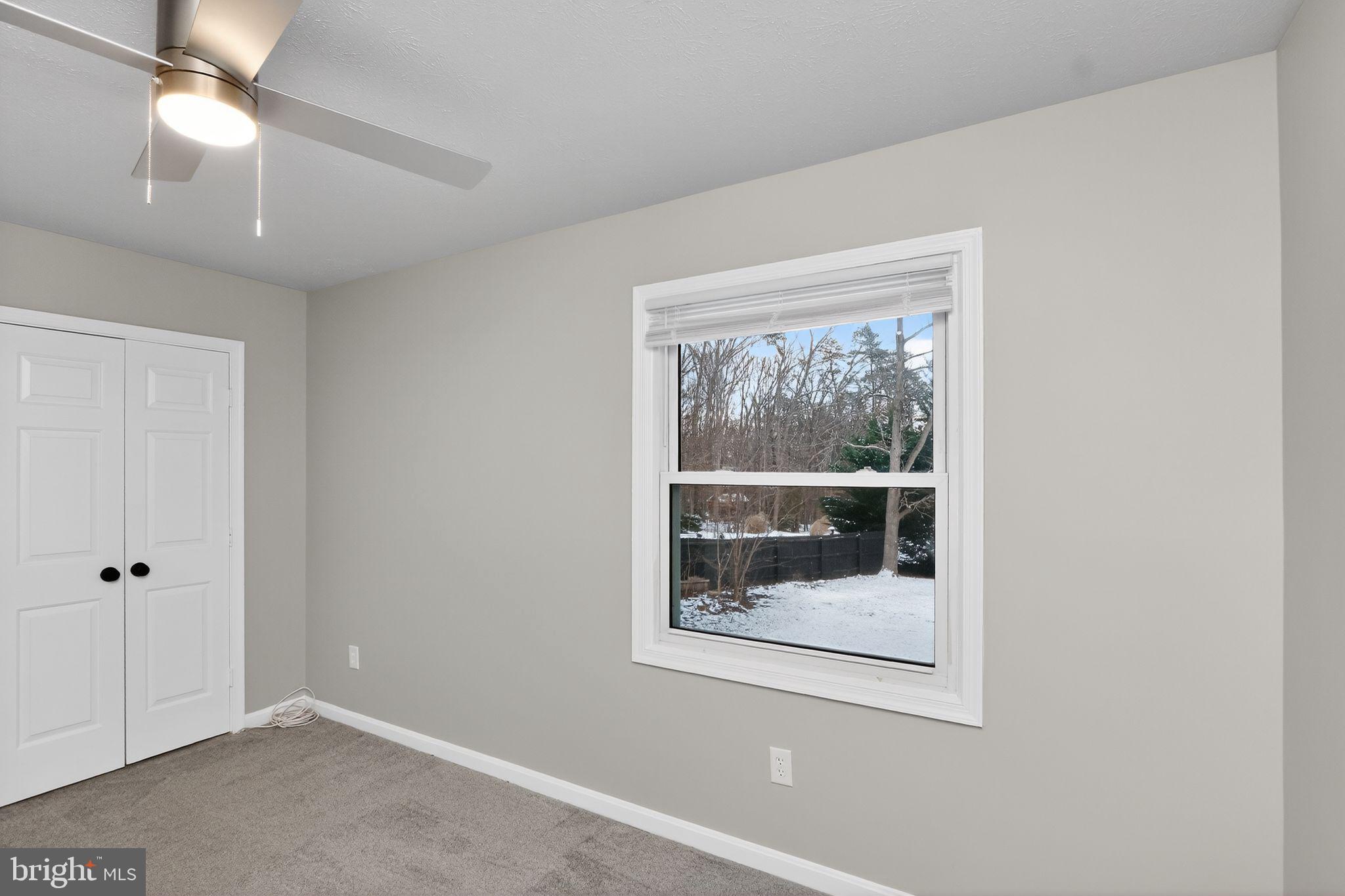 11979 Falling Creek Drive Manassas, VA 20112 - Photo 23 of 30 an empty room with a window
