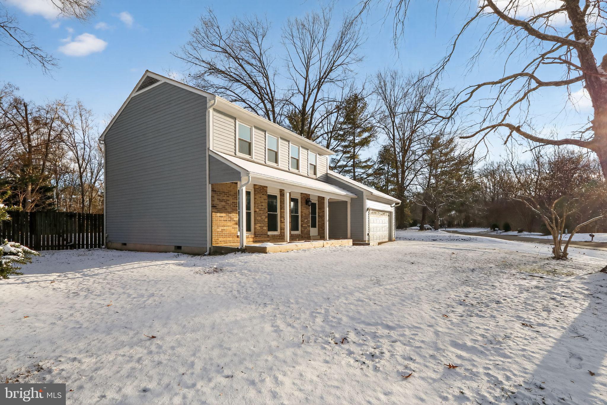 11979 Falling Creek Drive Manassas, VA 20112 - Photo 5 of 30 a front view of house with yard and trees around