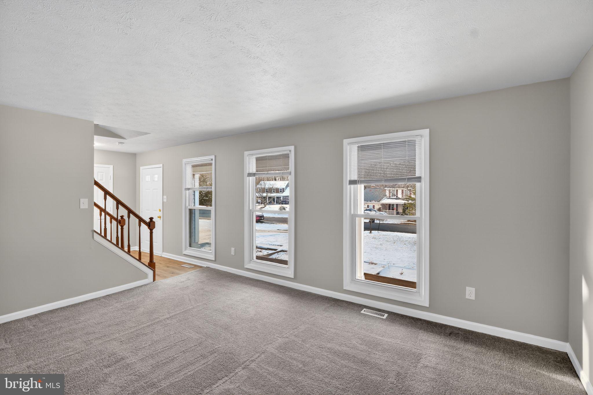 11979 Falling Creek Drive Manassas, VA 20112 - Photo 9 of 30 a view of an empty room with a window