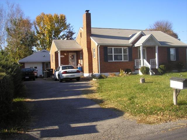 223 Knoll Road Roanoke, VA 24019 - Photo 1 of 1 a front view of a house with garden