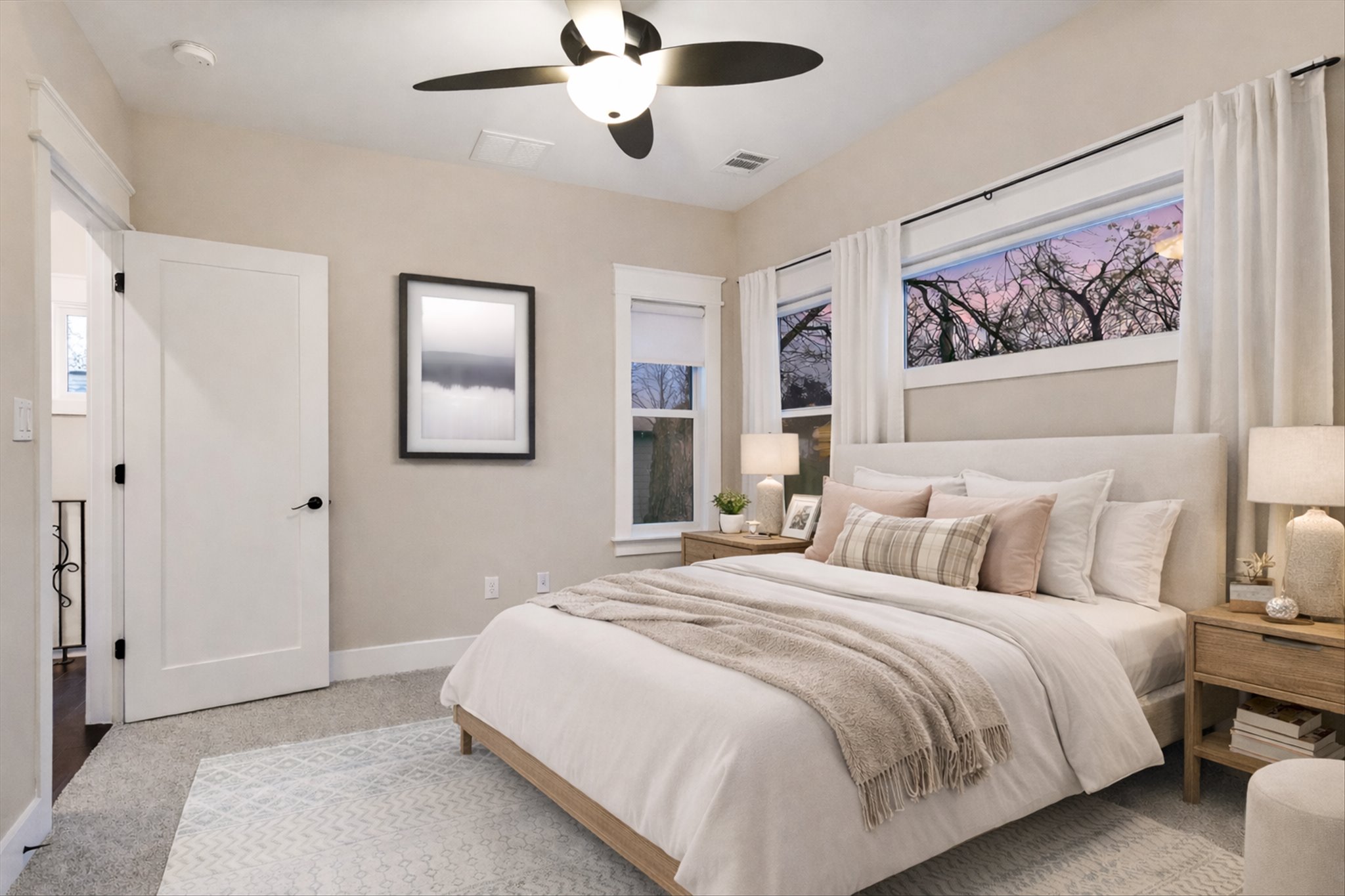 1613 Willow Street Austin, TX 78702 - Photo 17 of 30 a bedroom with bed and wall painting