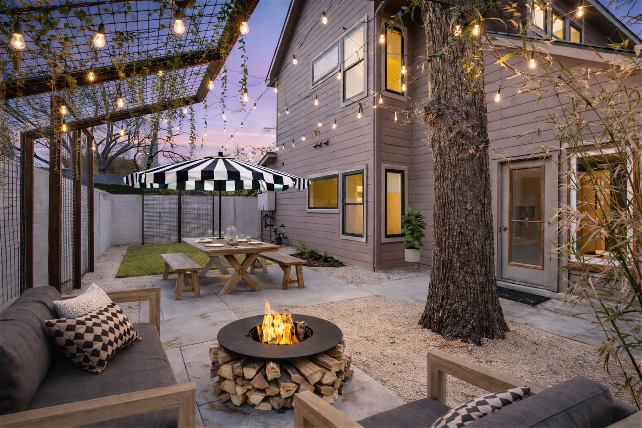 1613 Willow Street Austin, TX 78702 - Photo 23 of 30 a view of a chairs and tables in the patio