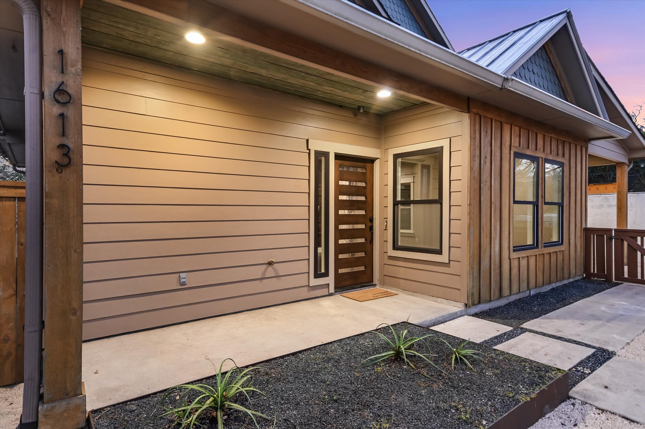 1613 Willow Street Austin, TX 78702 - Photo 28 of 30 a view of a porch with wooden stairs