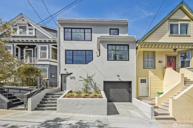 a front view of a multi story building