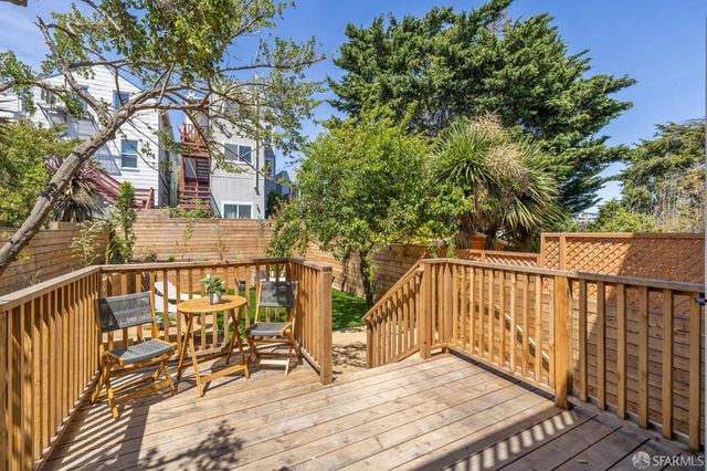 a view of a brick house with wooden floor