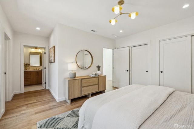 a view of a room that has a table and chair in it