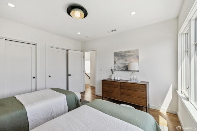 a bathroom with a sink toilet and mirror