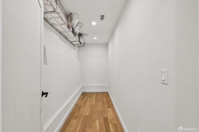 a bathroom with a toilet and a sink