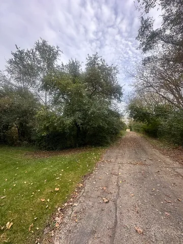 a view of outdoor space and yard