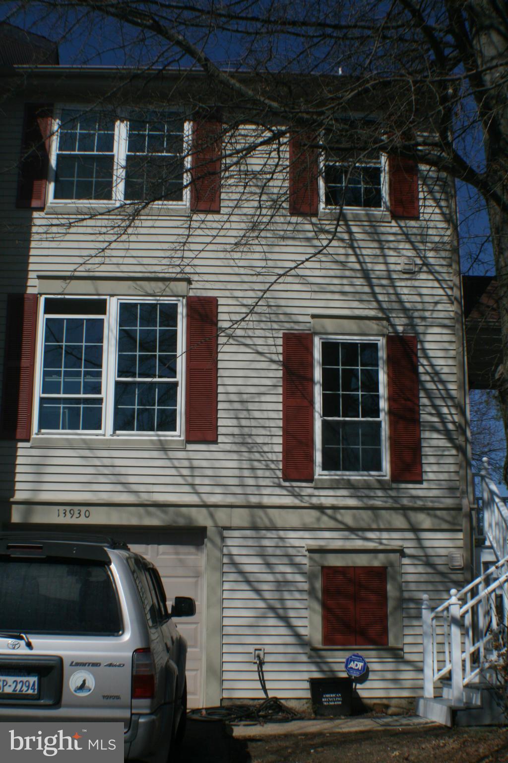 13930 Baton Rouge Court Centreville, VA 20121 - Photo 1 of 26 a front view of a house with barbeque area
