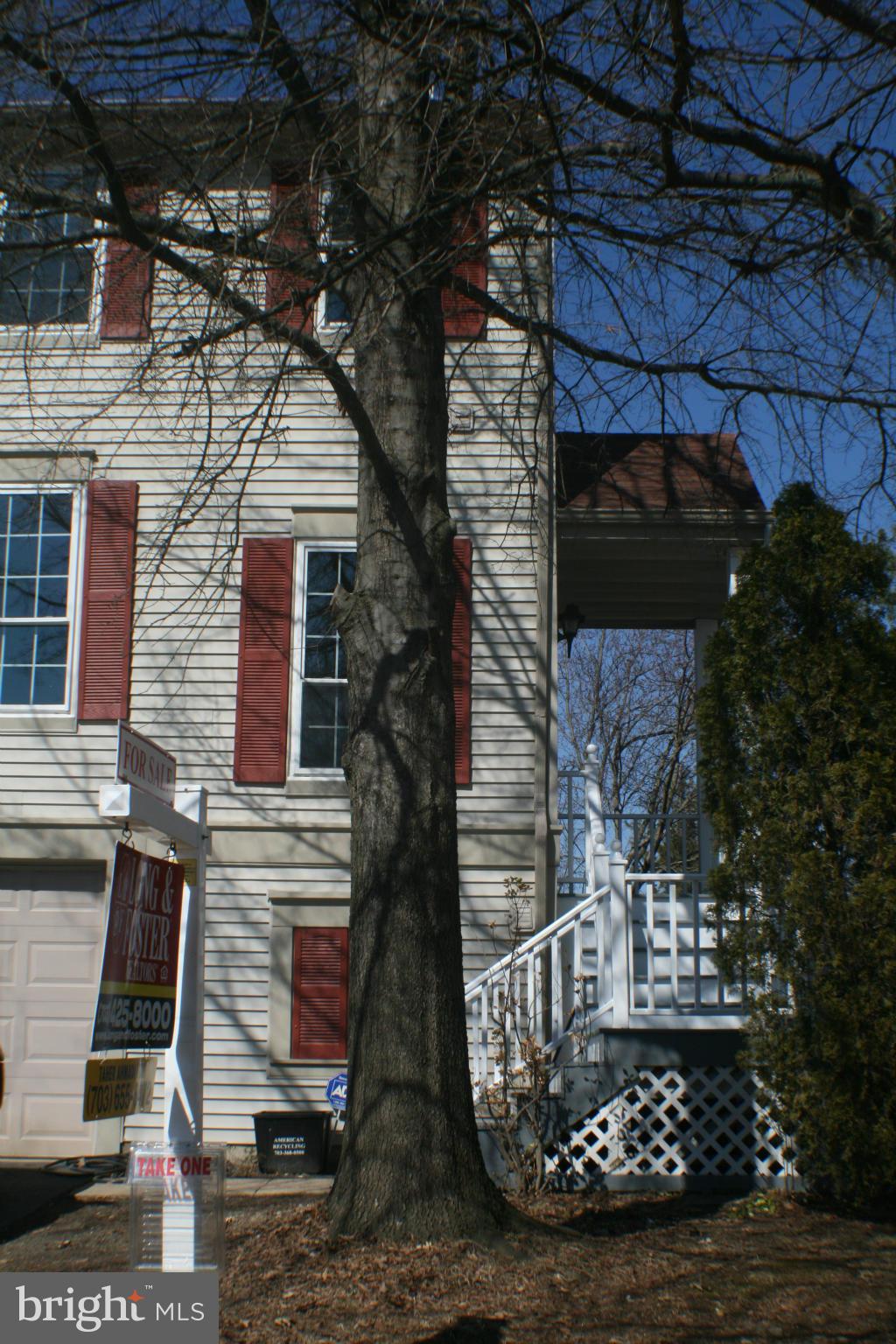13930 Baton Rouge Court Centreville, VA 20121 - Photo 19 of 26 a front view of a house with a yard