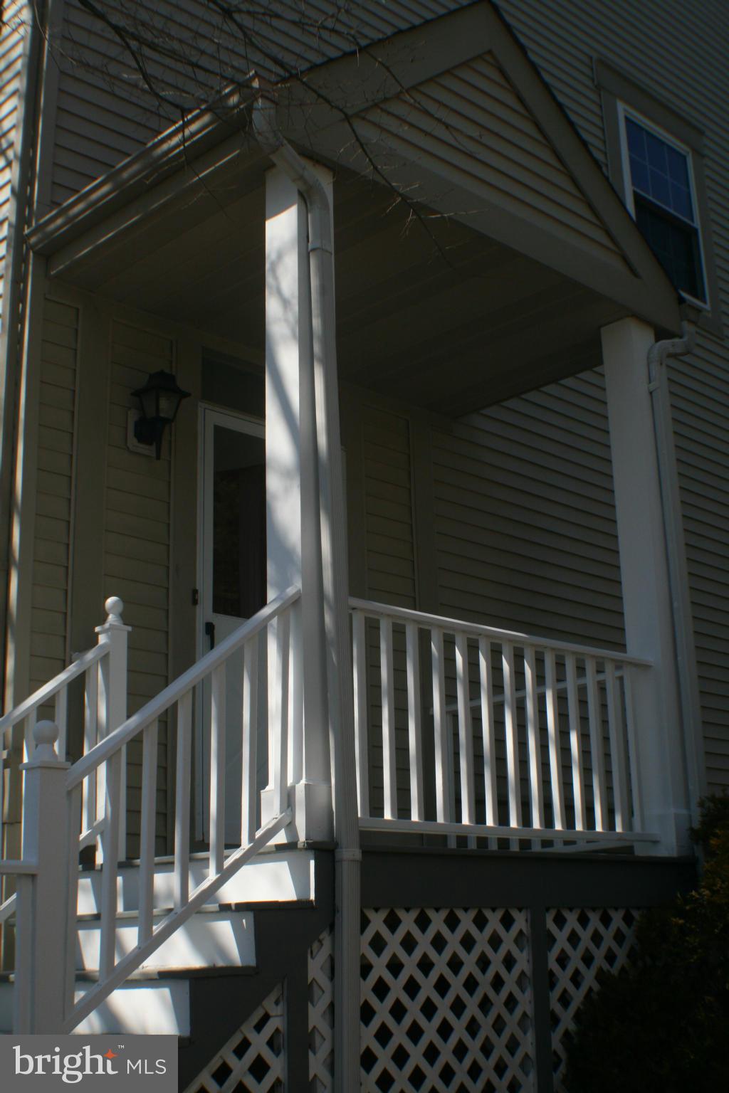 13930 Baton Rouge Court Centreville, VA 20121 - Photo 20 of 26 a view of wooden balcony