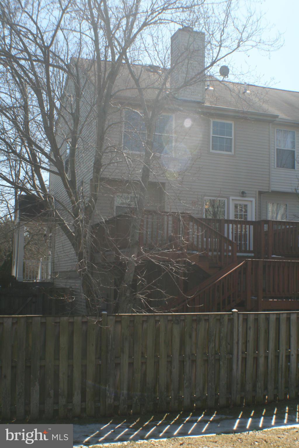 13930 Baton Rouge Court Centreville, VA 20121 - Photo 23 of 26 a view of a wooden fence