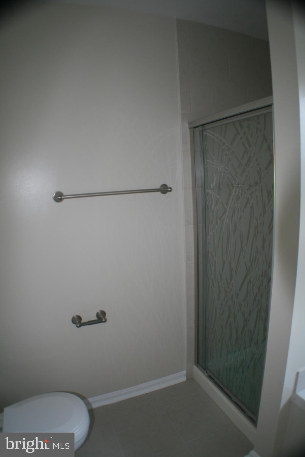 13930 Baton Rouge Court Centreville, VA 20121 - Photo 6 of 26 a bathroom with a shower