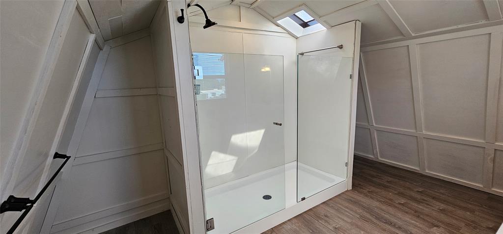 444 Geronimo Quitman, TX 75783 - Photo 26 of 34 a bathroom with a glass shower door and sink