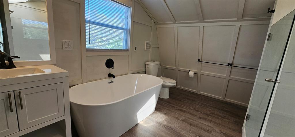 444 Geronimo Quitman, TX 75783 - Photo 28 of 34 a spacious bathroom with a bathtub and sink