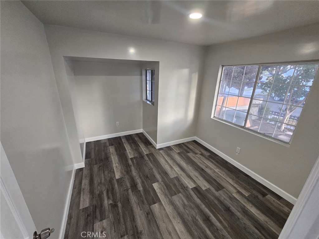 3427 Bell Avenue Bell, CA 90201 - Photo 11 of 12 a view of wooden floor in an empty room