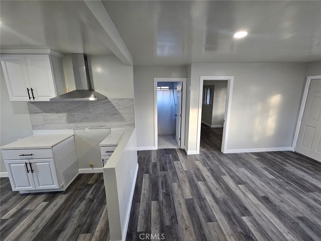 3427 Bell Avenue Bell, CA 90201 - Photo 5 of 12 a view of a livingroom with wooden floor
