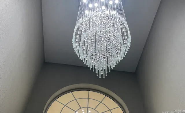 a view of a hallway with wooden door