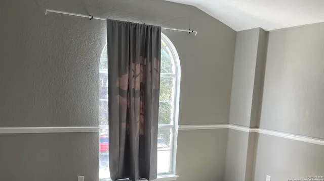 a view of a small space with a window