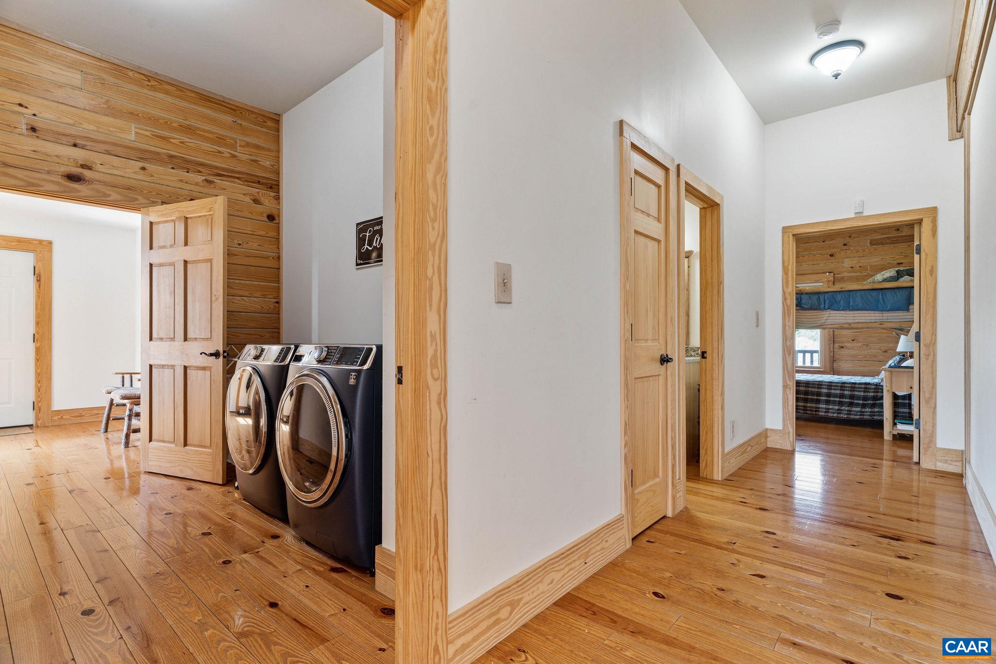 42 River Ridge Lane Stanardsville, VA 22973 - Photo 44 of 70 a view of a hallway with washer and dryer