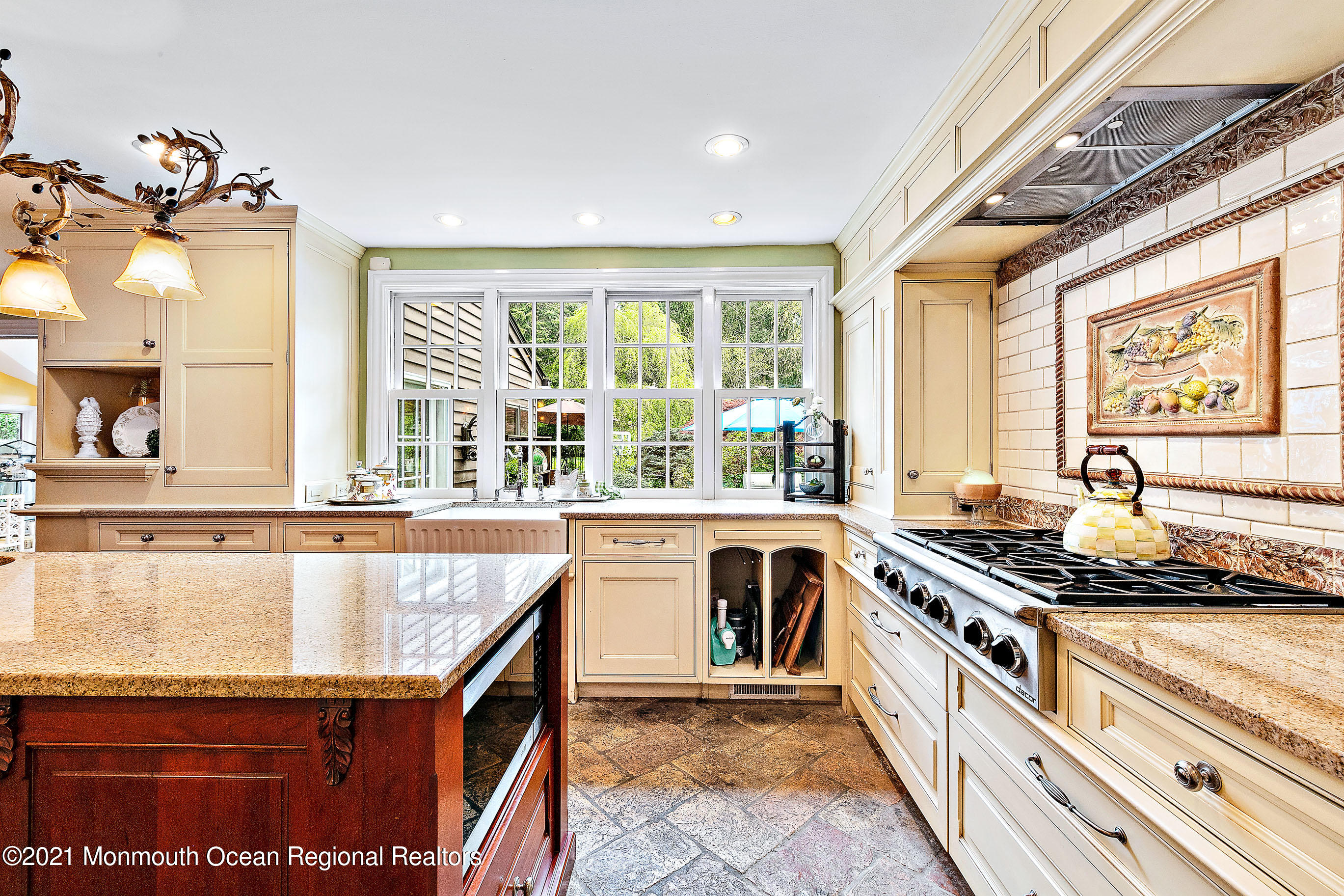 5 Post Road Rumson, NJ 07760 - Photo 16 of 67 a kitchen with stainless steel appliances granite countertop a stove and a sink