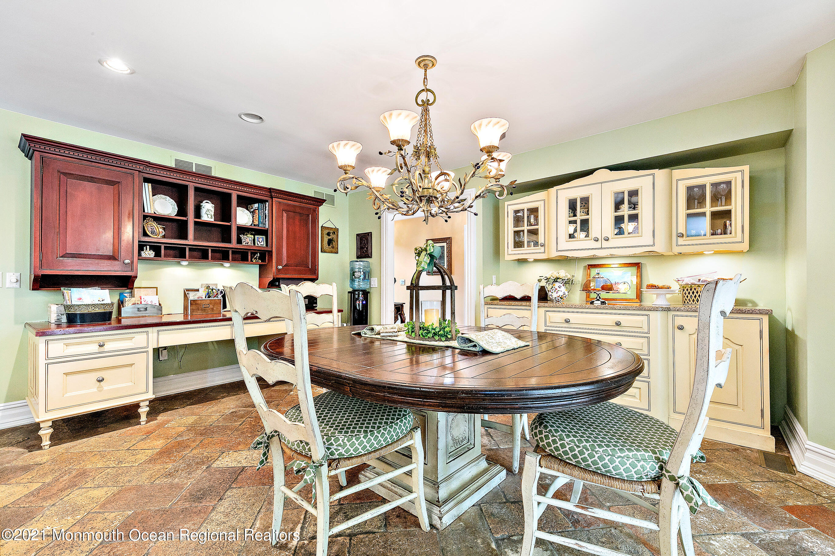 5 Post Road Rumson, NJ 07760 - Photo 18 of 67 a dining room with wooden floor and a chandelier