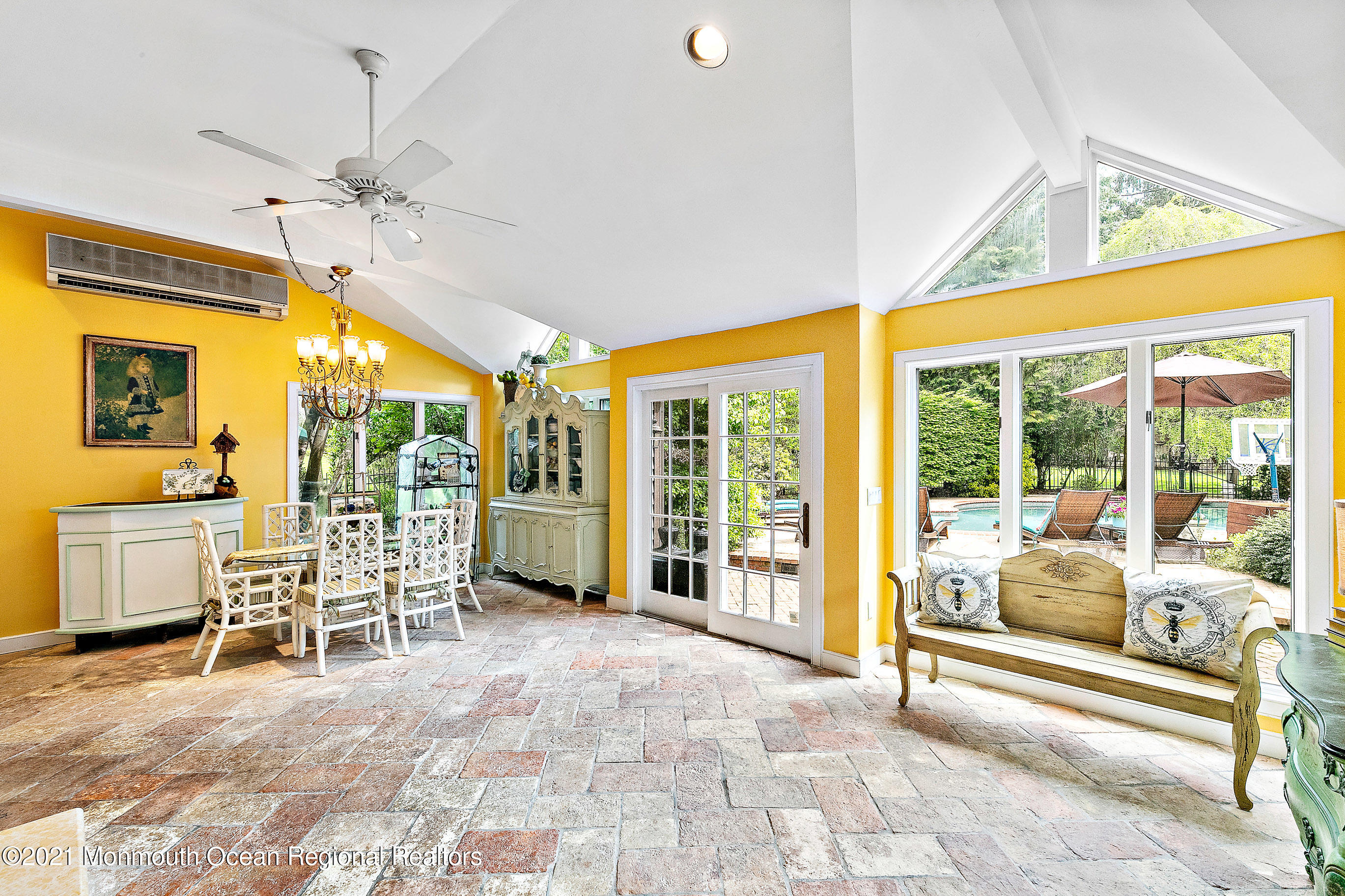 5 Post Road Rumson, NJ 07760 - Photo 19 of 67 a living room with furniture a large window with outer view